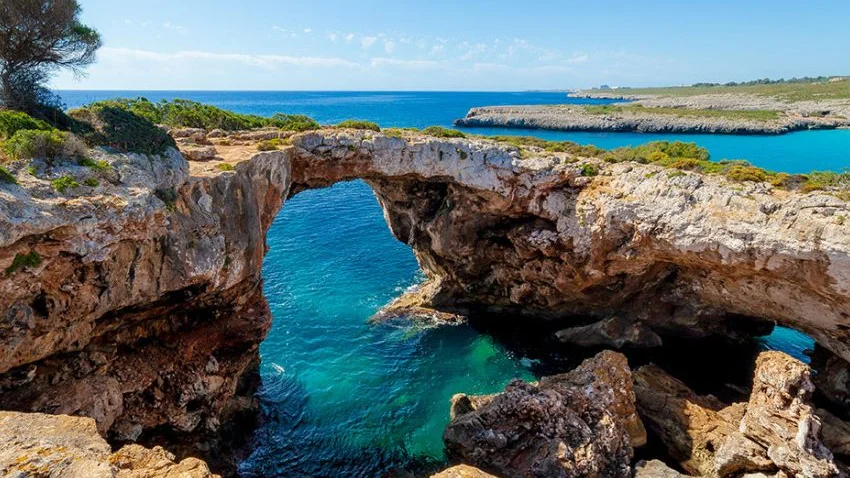 Cliff jumping in Cala varques